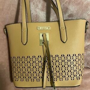 Tan mid-size top handle bag